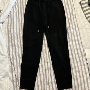 H&M black dress pants with draw string. Women’s US 4